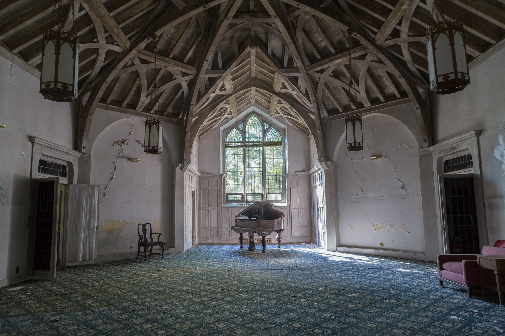 Abandoned Brandywine Estate with high ceilings and a piano in Briarcliff Manor NY