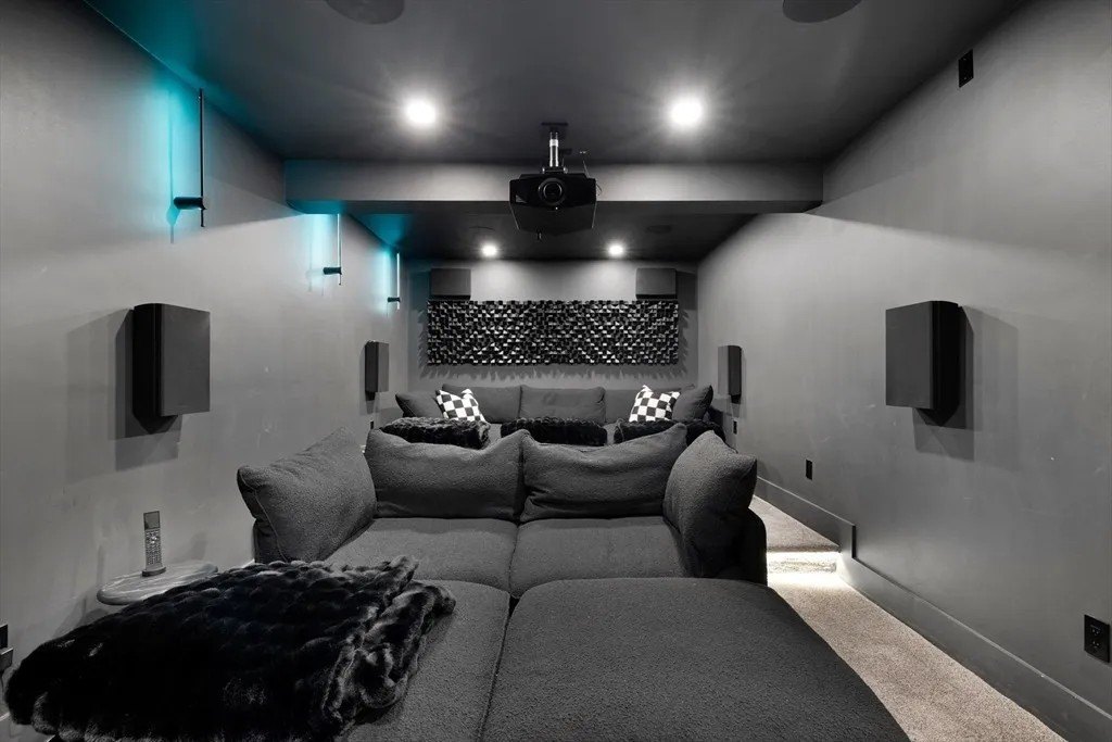 Media room in a luxury home in Massachusetts that belongs to Jrue Holiday