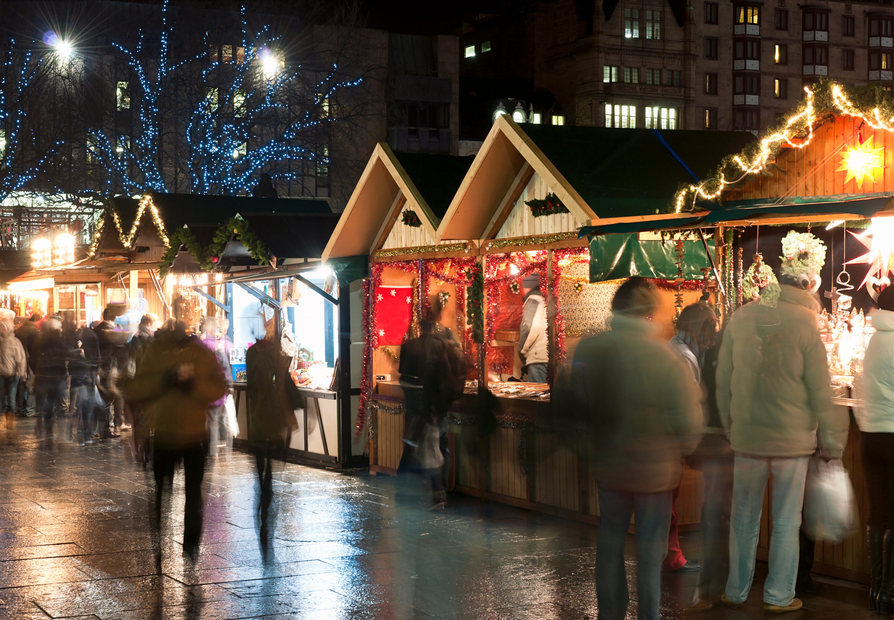 Customers at an outdoor Christmas market
