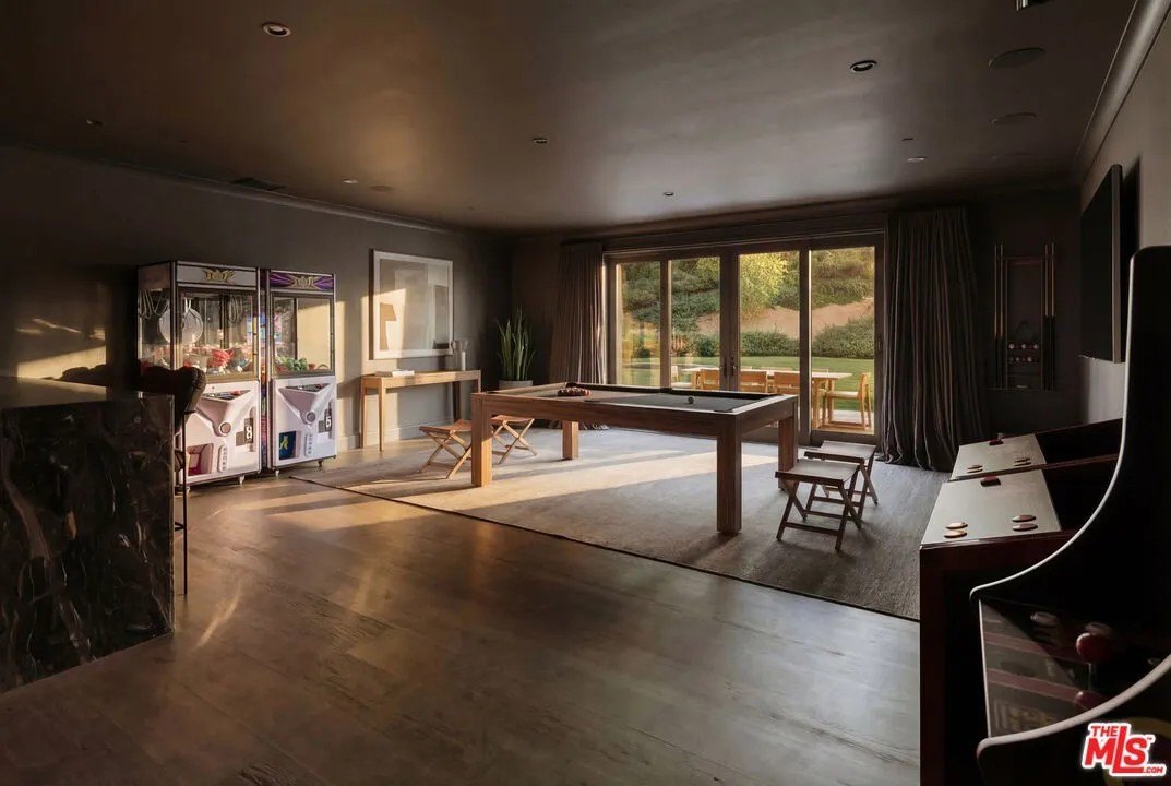 A game room with a pool table in a home in Hidden Hills California belonging to Kylie Jenner