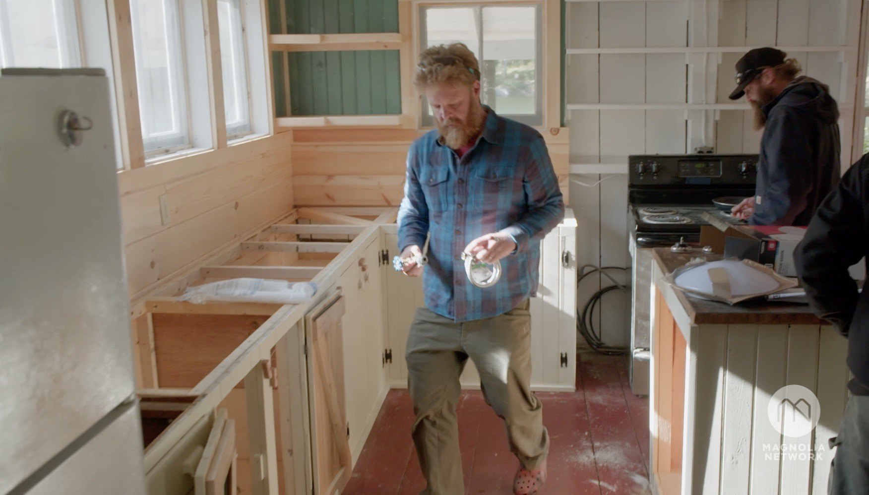 The island location of the cabin creates logistical challenges during the renovation.