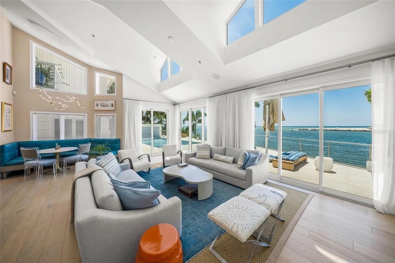 Soaring vaulted ceilings and generous windows give seem to expand the already sizable space.