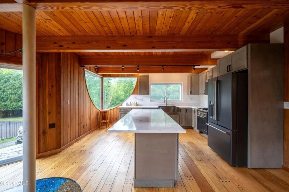 Modern kitchen of midcentury home in Hague, NY, on sale for $995,000