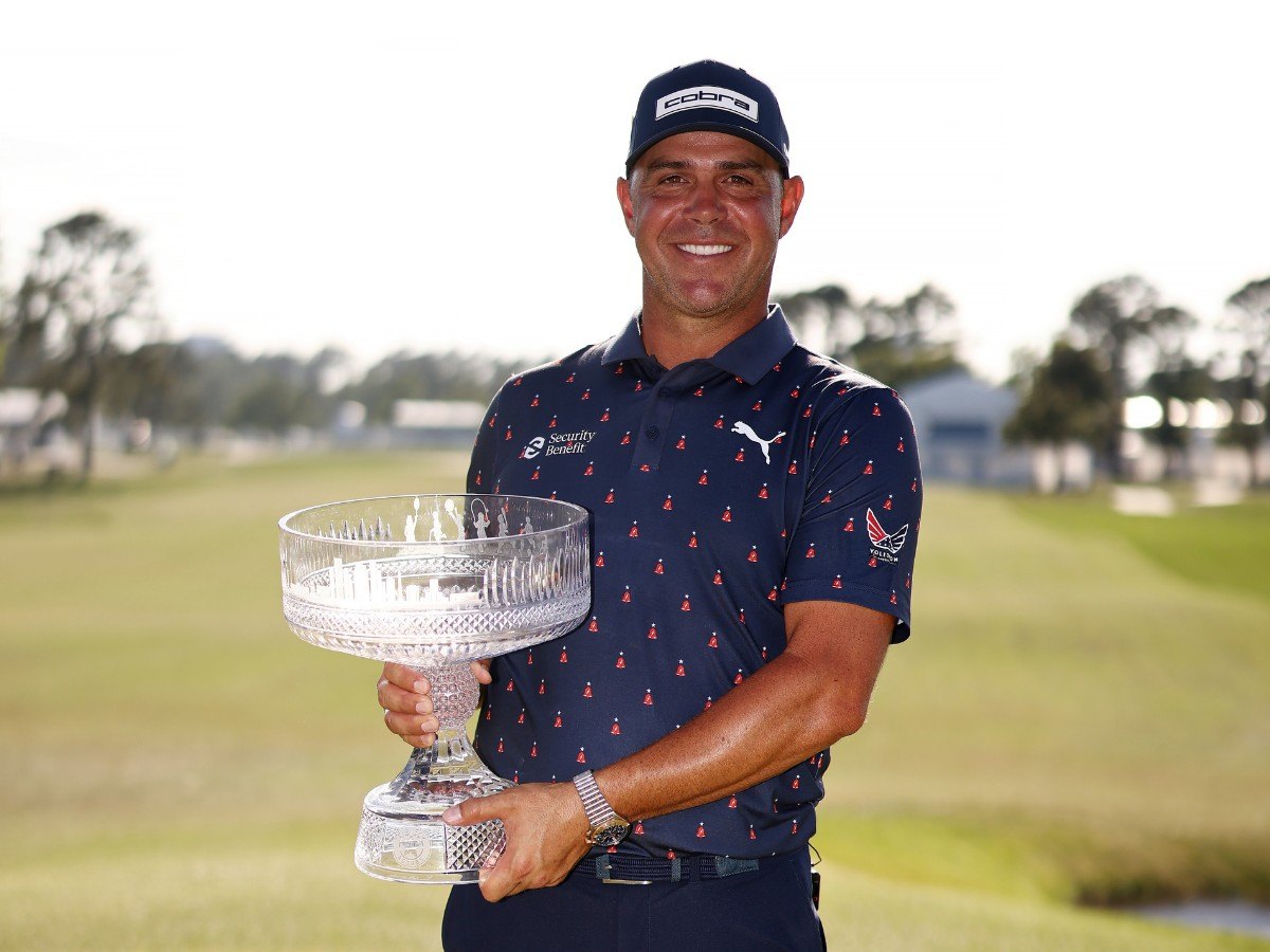 Gary Woodland poses with his trophy after winning the Houston Open on March 29