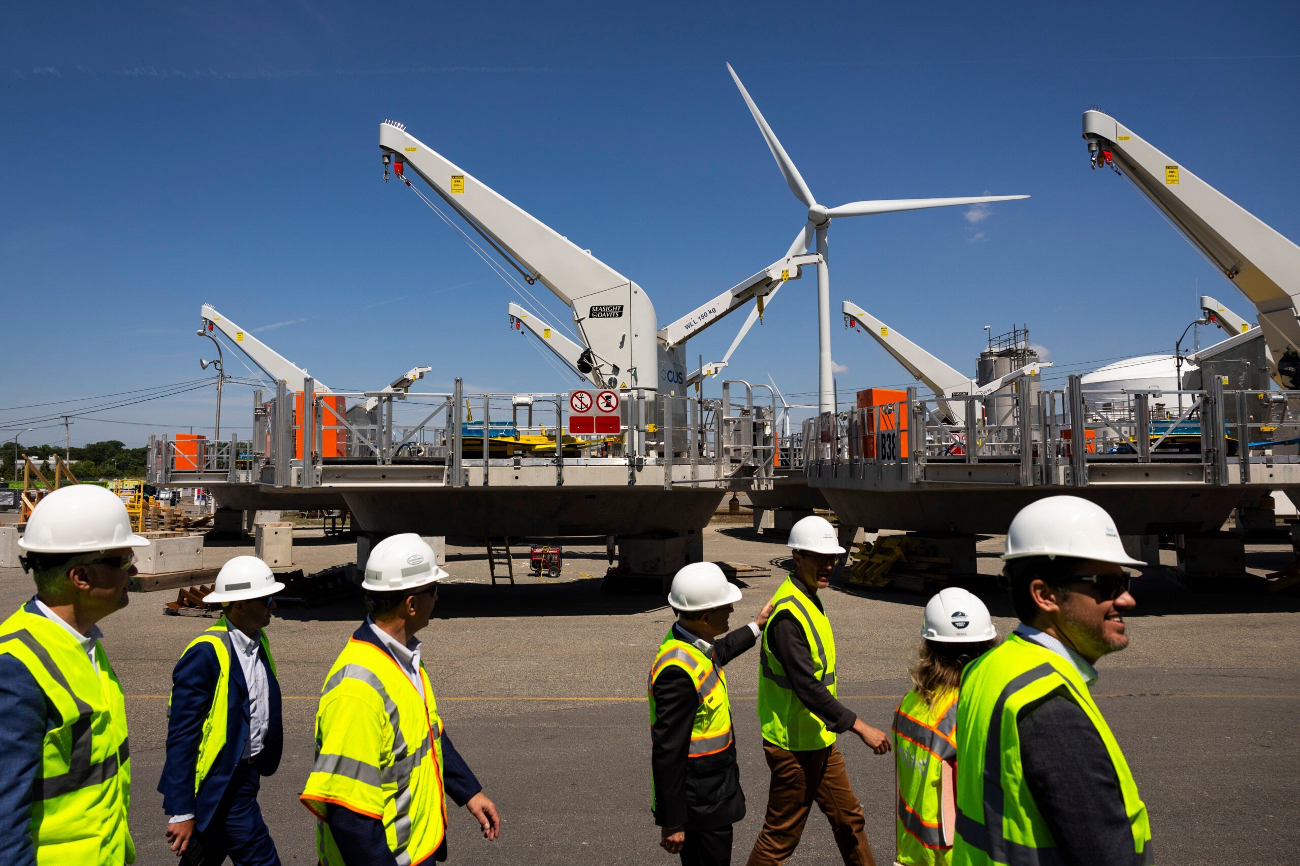 Wind turbine foundation components at the Revolution Wind construction hub at the Port of Providence in Providence, Rhode Island
