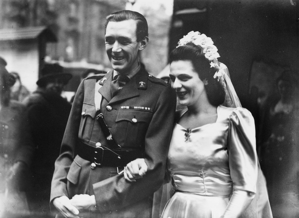 British army officer Major Bruce Shand (1917 - 2006) of the 12th Royal Lancers, marries Rosalind Cubitt, daughter of Roland Cubitt, 3rd Baron Ashcombe, at St Paul's Church in Knightsbridge, London, 2nd January 1946. The couple are the parents of Camilla, Duchess of Cornwall. (Photo by Keystone/Hulton Archive/Getty Images)