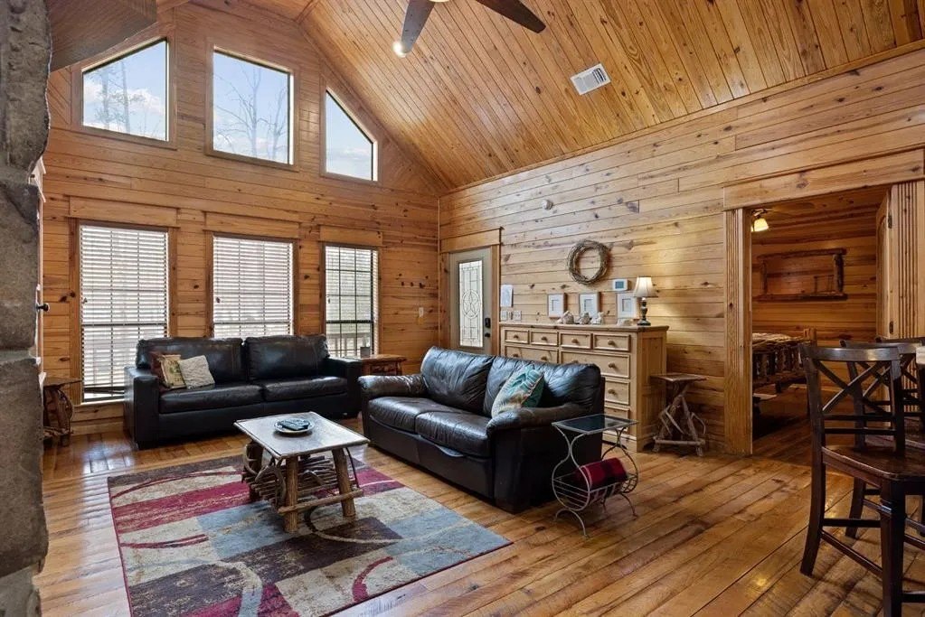 A two-bedroom, two-bath cabin is listed for $349,000 and sits on a quiet cul-de-sac.