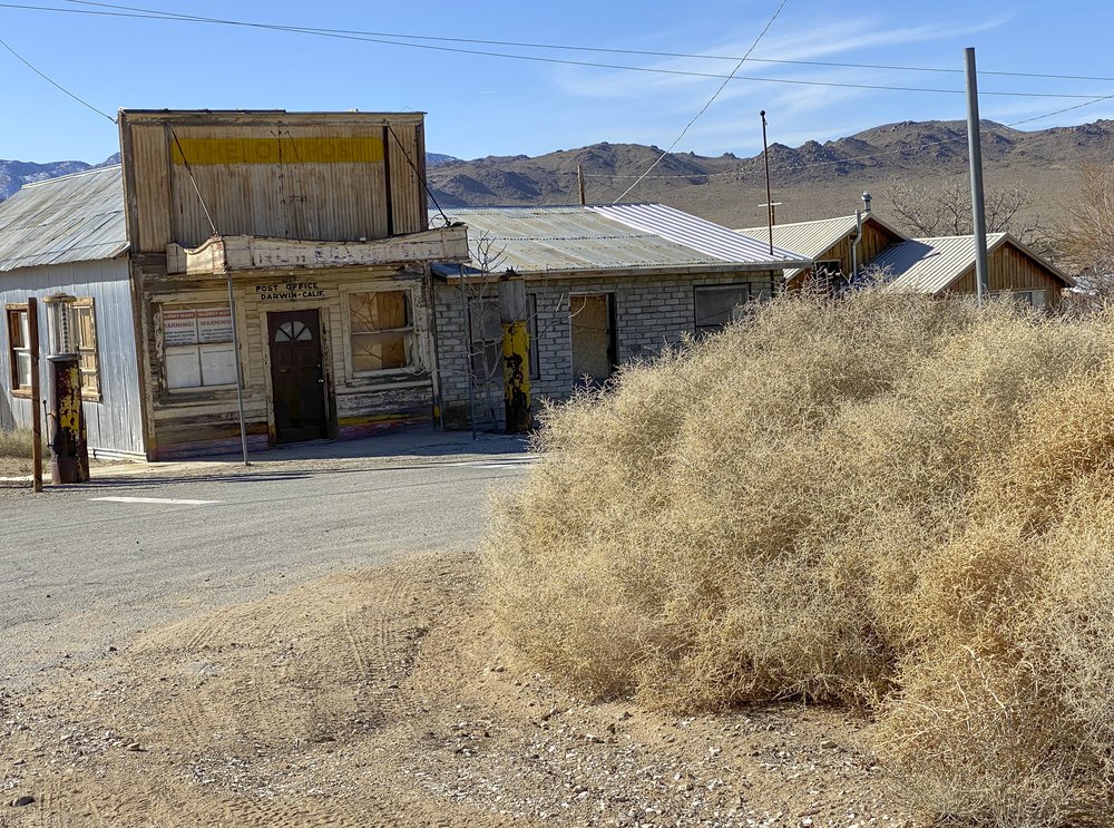 The derelict post office building in a semi-ghost town in the California desert.