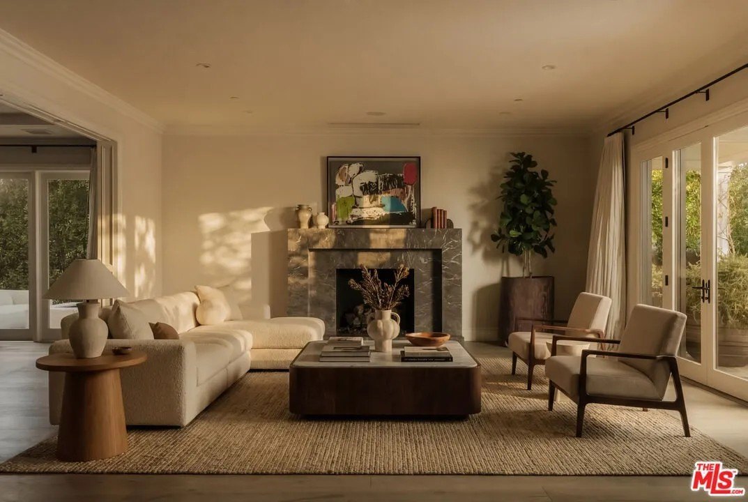 Living space with large fireplace in a home in Hidden Hills California belonging to Kylie Jenner