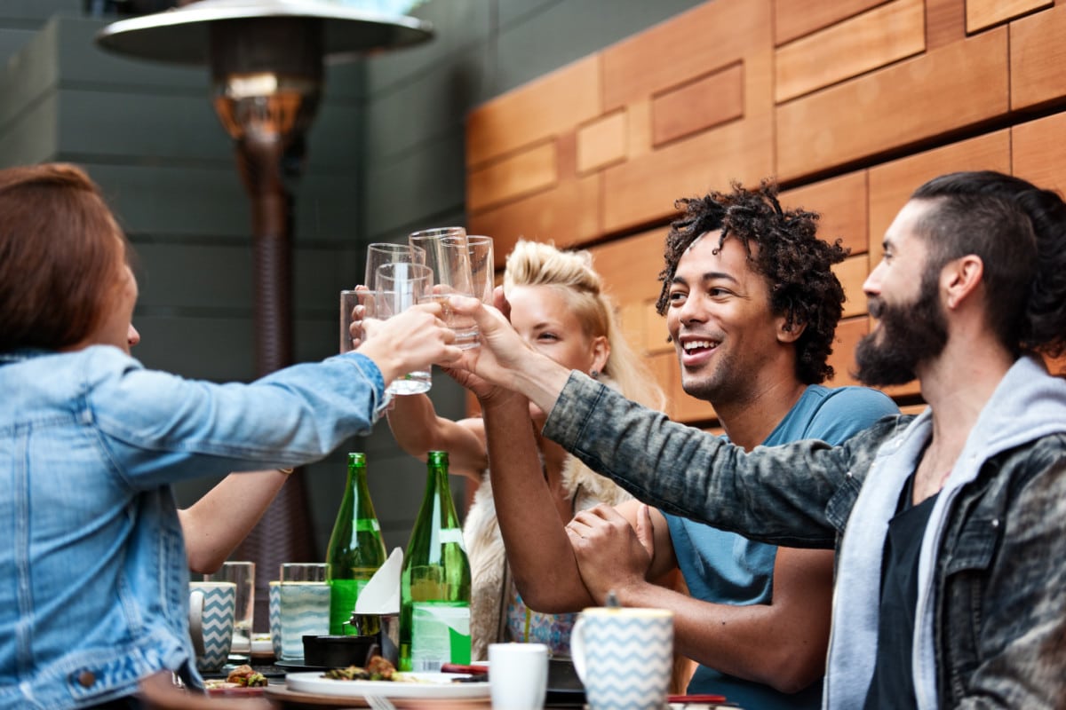 Group of friend eating outdoors