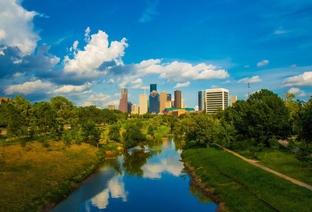 view of houston skyline from a body of water