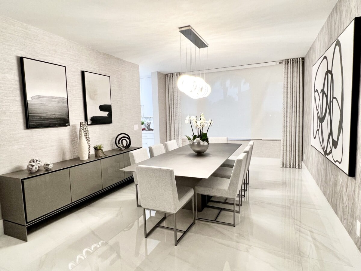 Modern dining room lit by a LED fixture