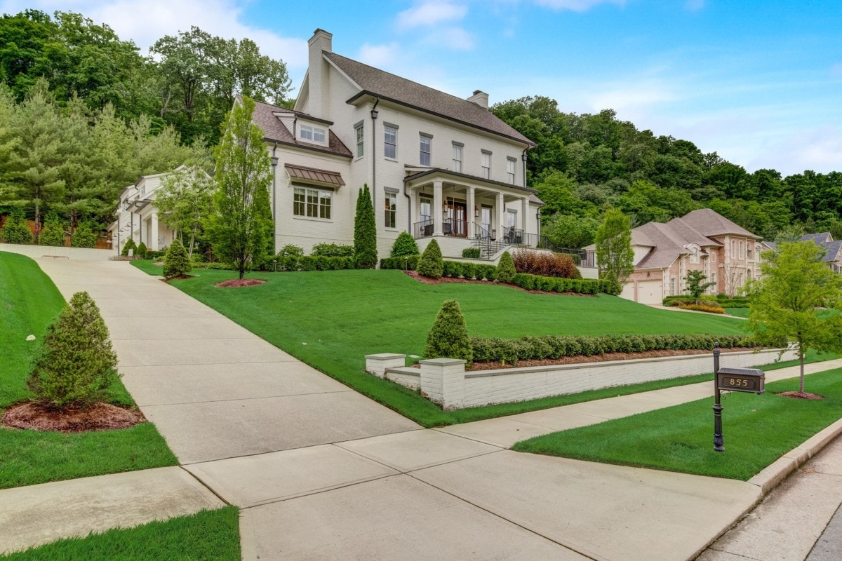 front-of-home-green-grass-inherited-house