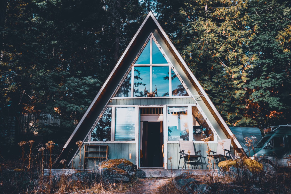 traditional a frame house exterior with large windows