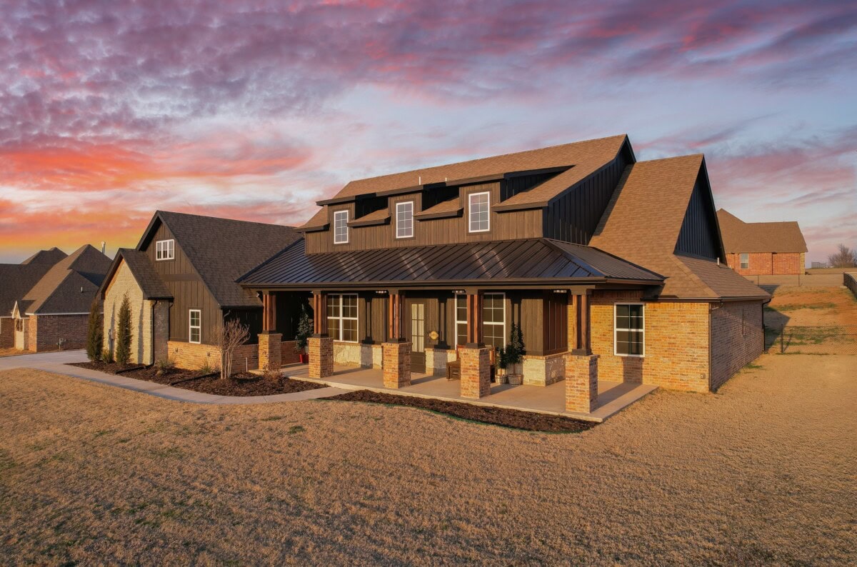 modern farmhouse at sunset in oklahoma