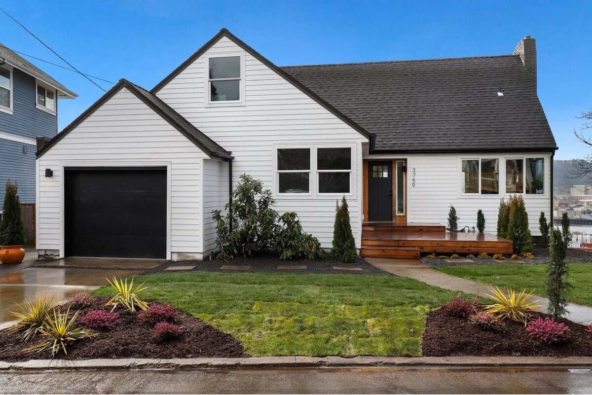 new construction home with white and black exterior