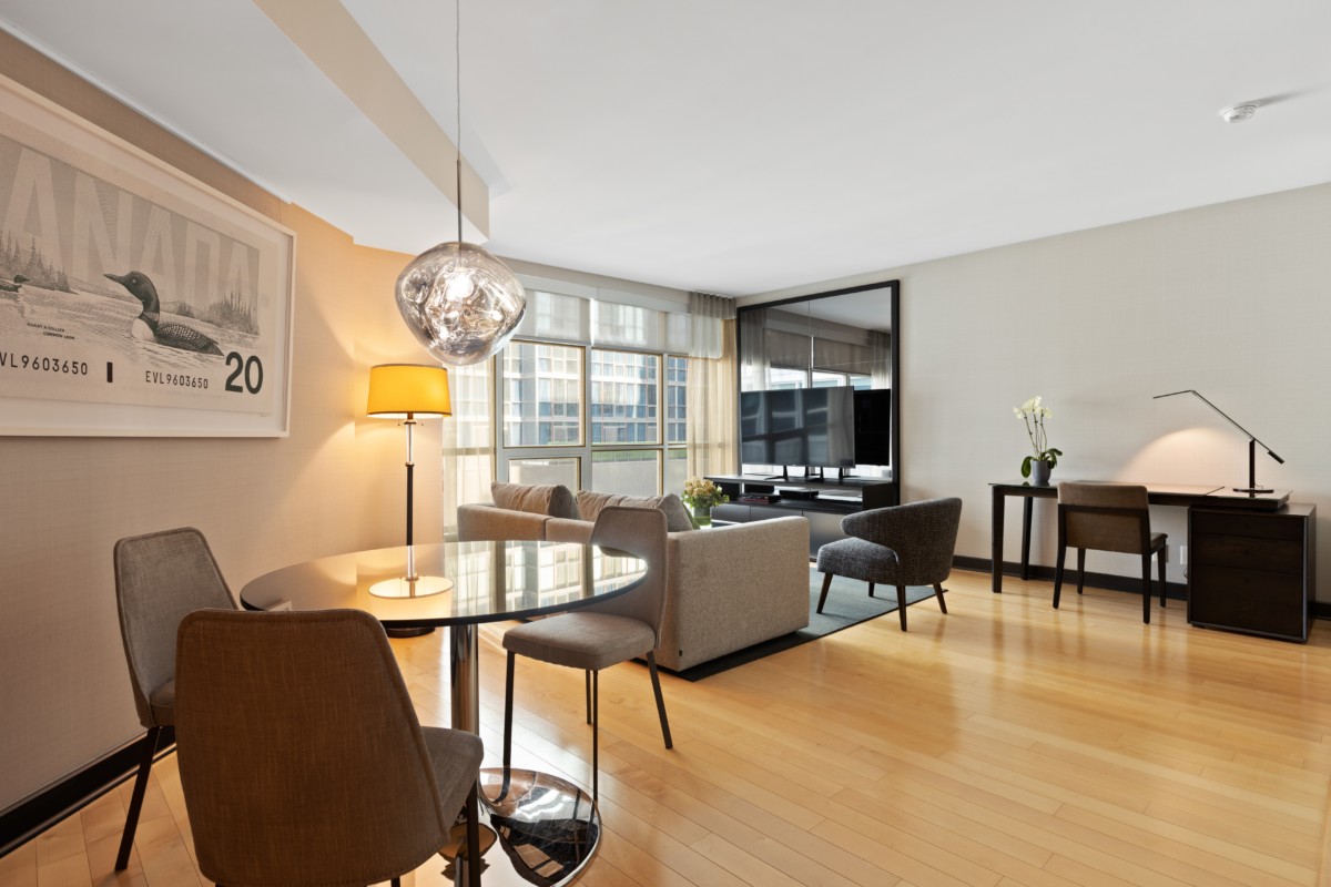 modern studio apartment dining table living room and desk