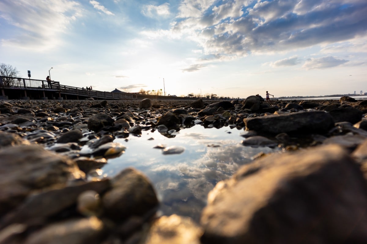 beach in quincy massachusetts with rocks and cloudy sky