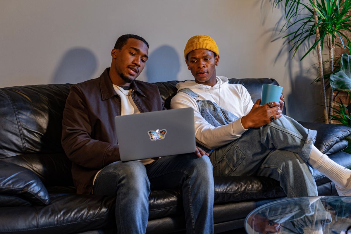 roommates sitting on a couch