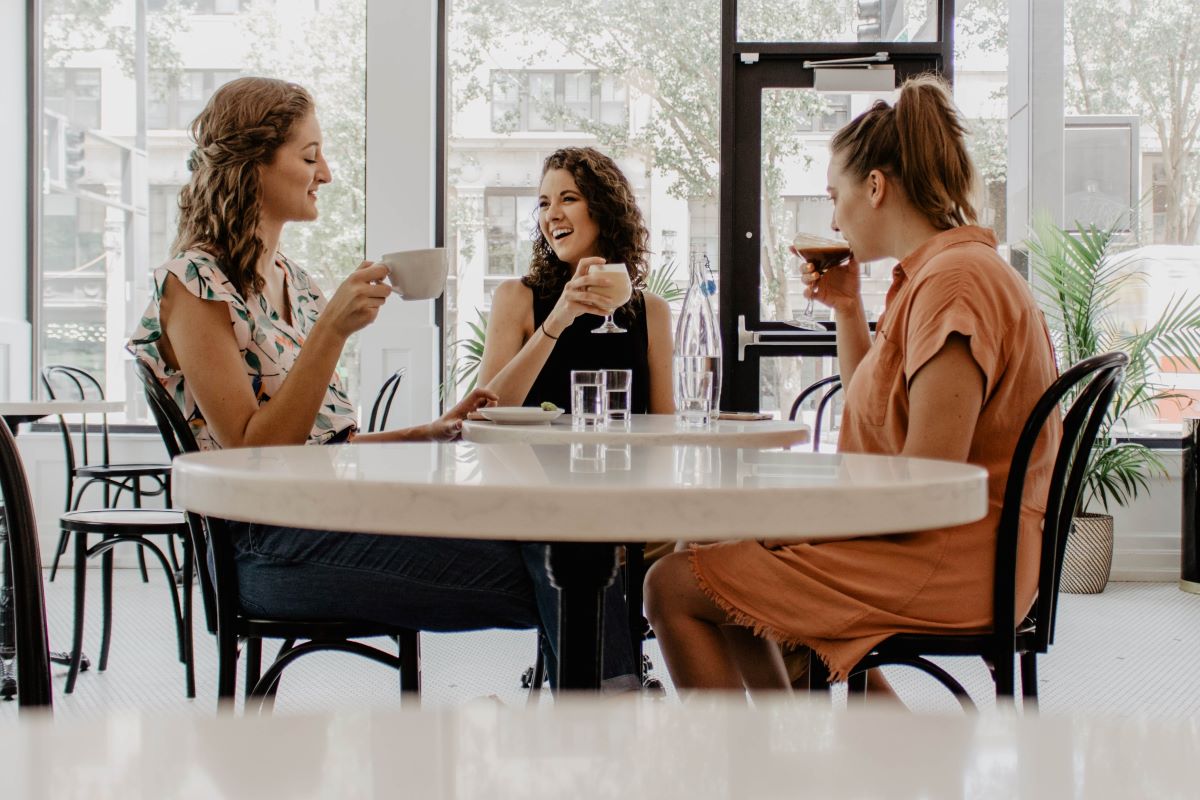 friends drinking at a cafe