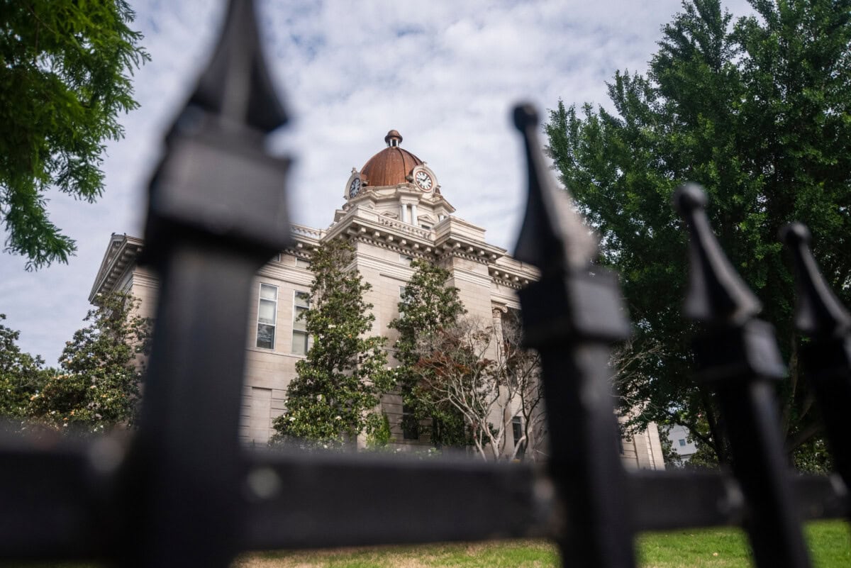 tupelo courthouse through fence_shutterstock