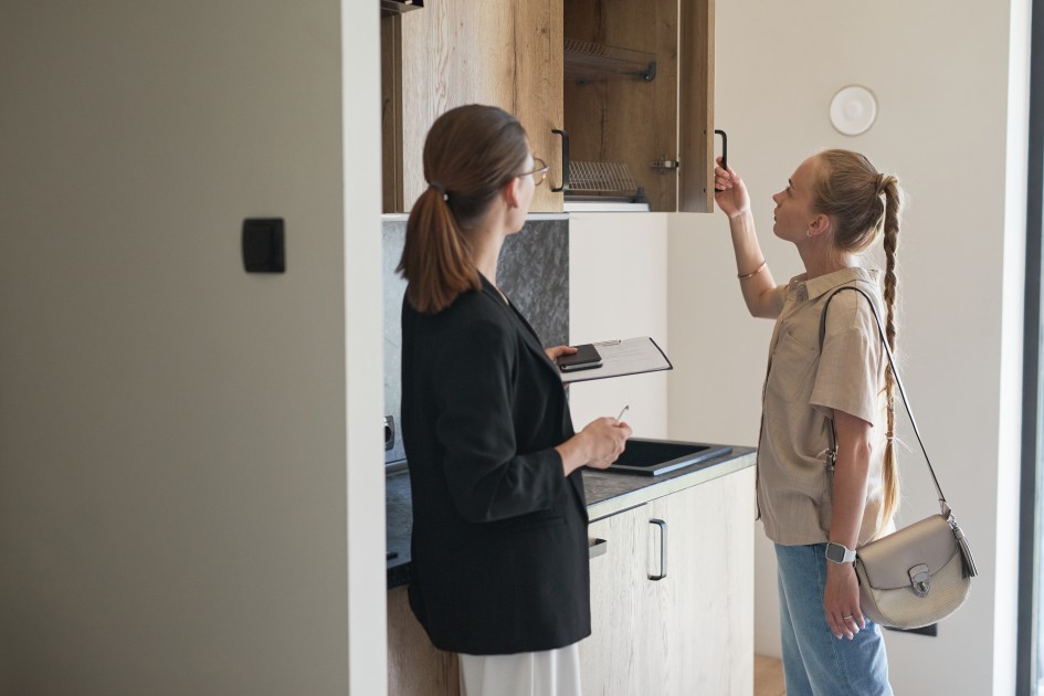 Checking out the kitchen during a home tour.