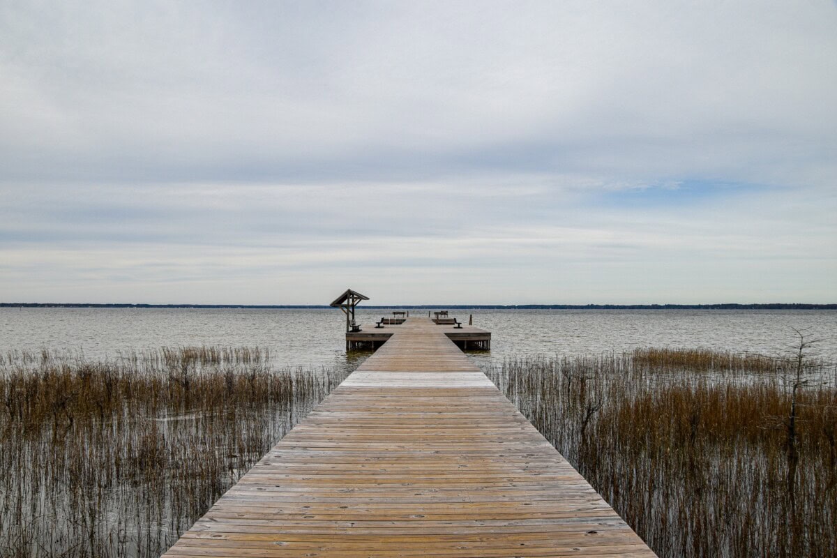 lake waccamaw in north carolina boardwalk_shuttertstock