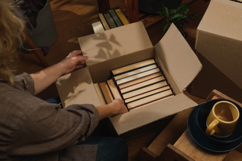 Oversized books: Lay flat in boxes or suitcases to avoid spine damage. Wrap them individually for added protection.