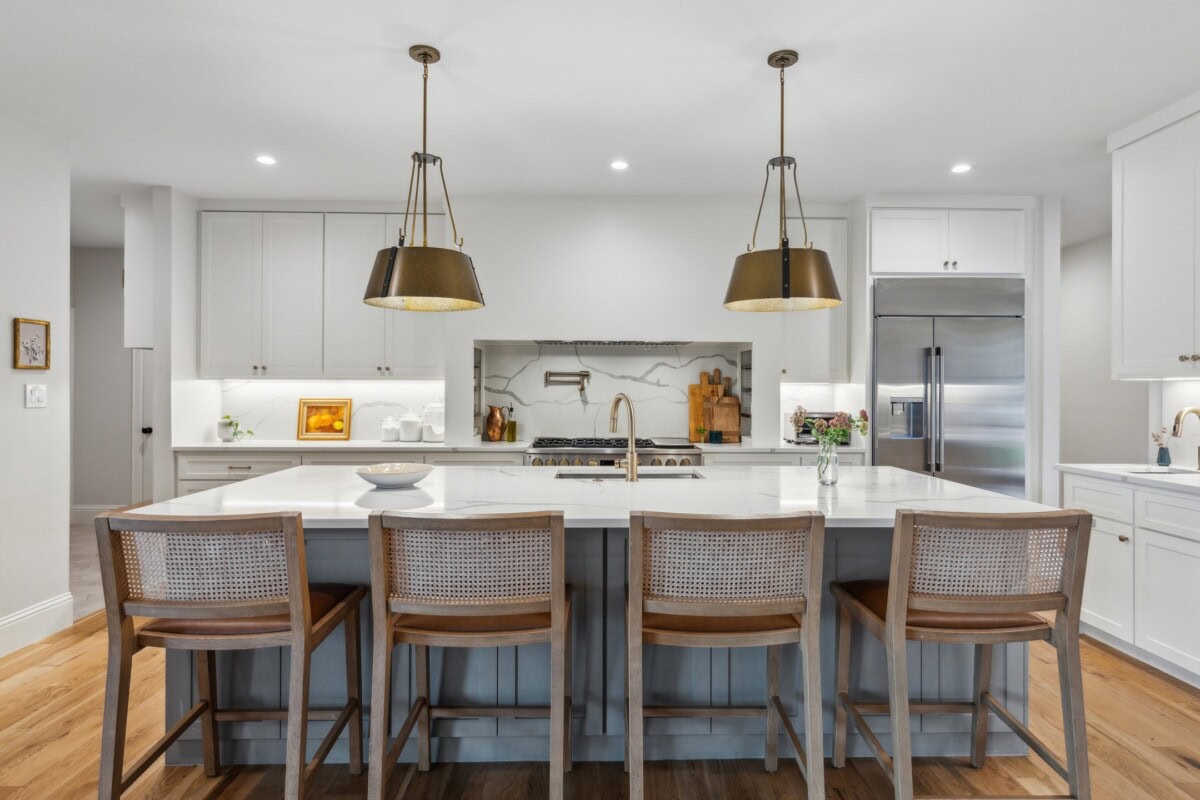 sleek white kitchen with designer upgrades