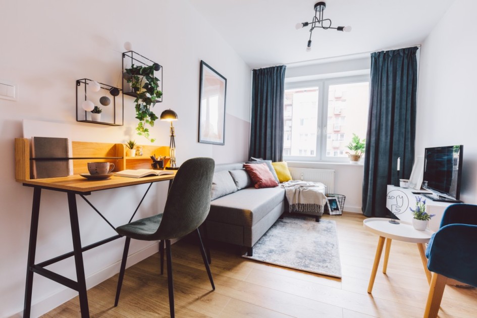 A recreational or office room that has just been staged, a step about halfway through the timeline for selling a house. 