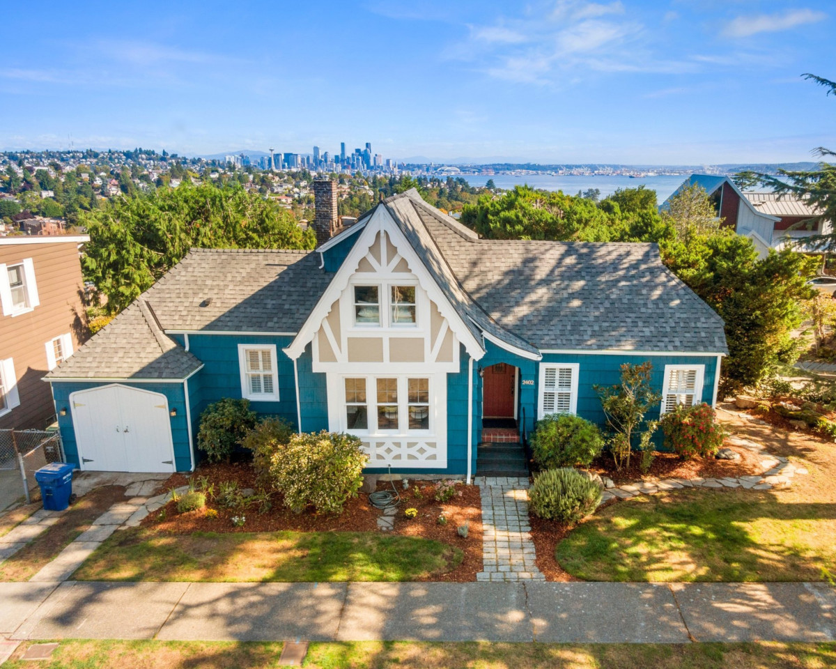 storybook tudor that has blue exterior