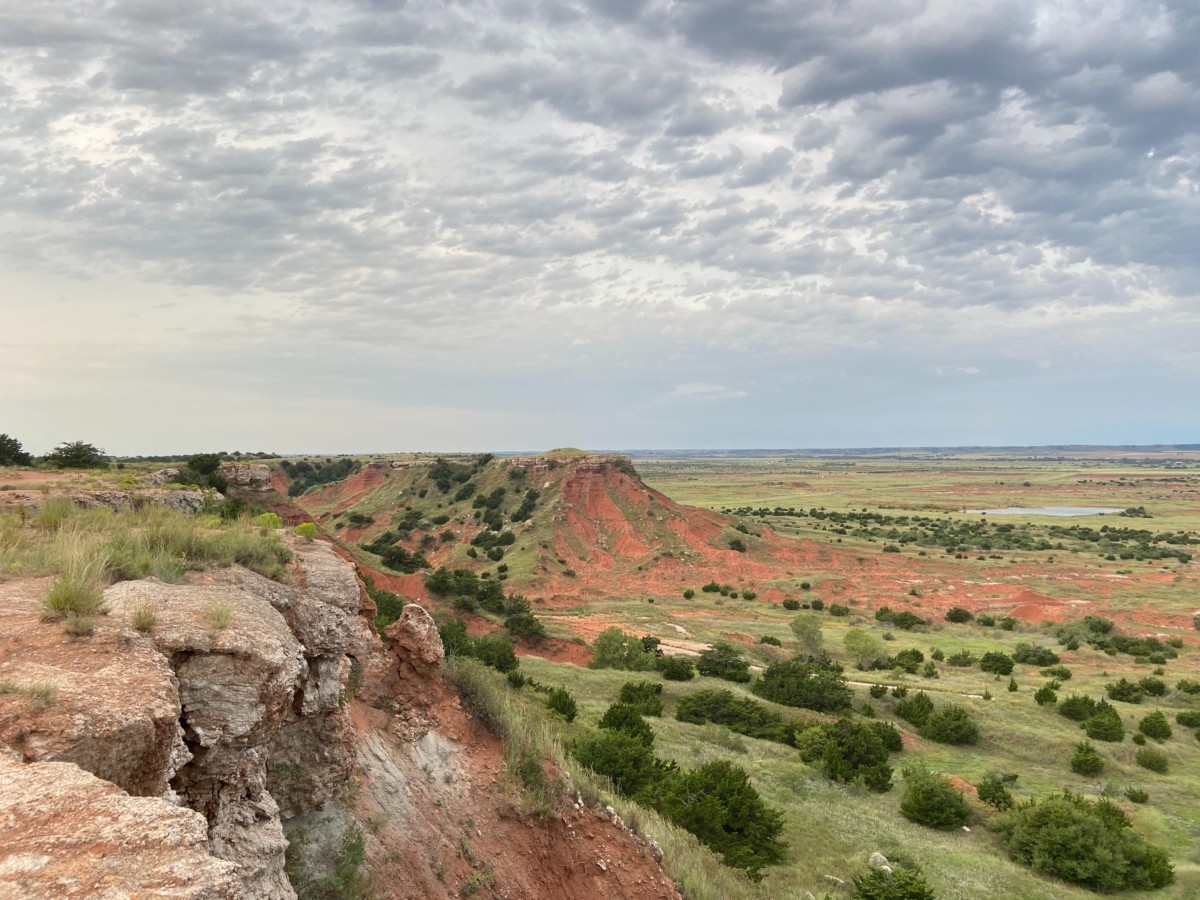 oklahoma mountains during the day with a blue sky and clouds