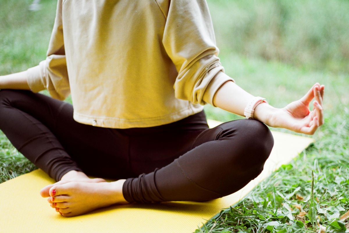 person doing outdoor yoga