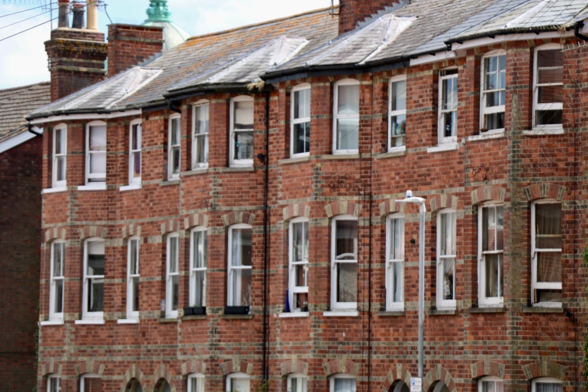 row of brick terraced houses
